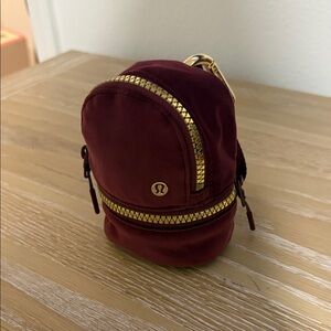 Lululemon Athletica Wine Red Mini Bag with Gold Zipper